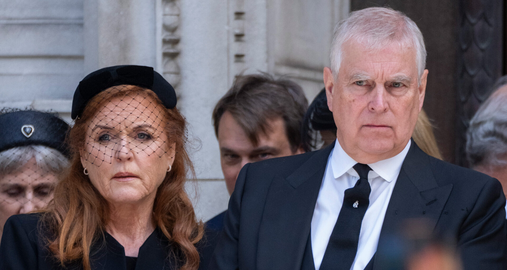 Sarah Ferguson and Prince Andrew both look somber while wearing black