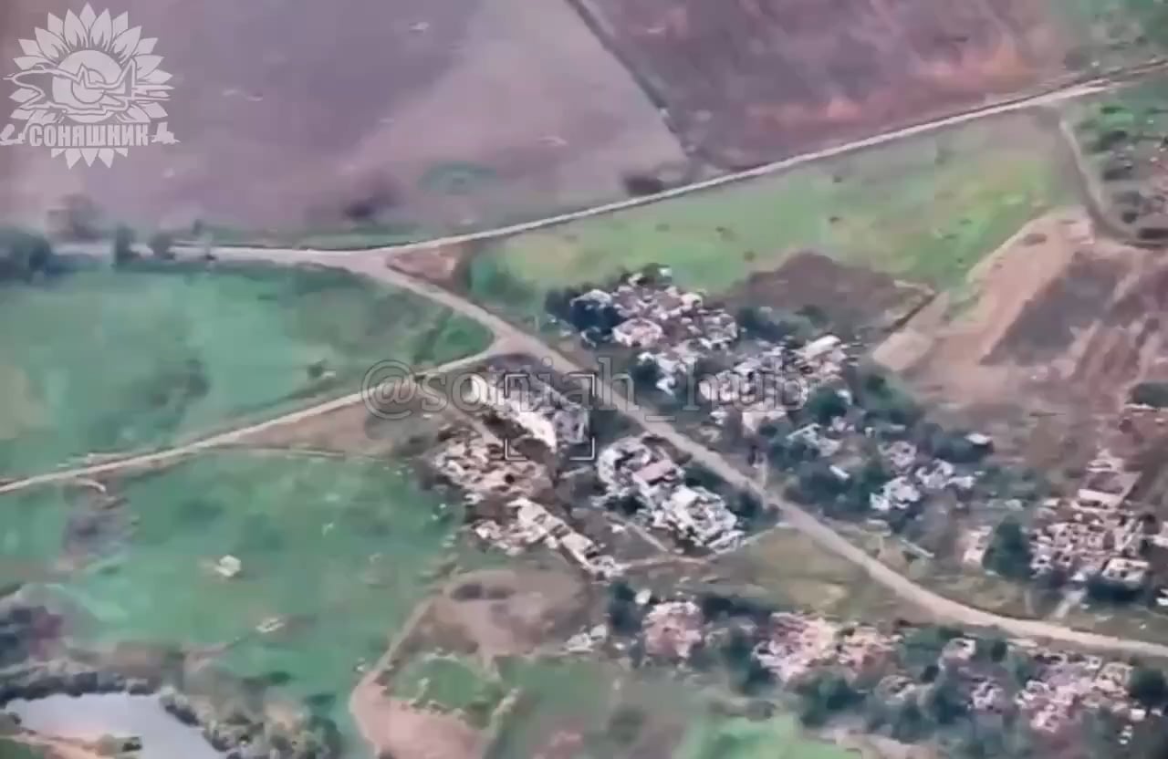 Drone footage of a Ukrainian fighter jet, using a precision-guided bomb, attacking a Russian command post in one of the buildings and at the same time seeming to have hit an ammunition depot.