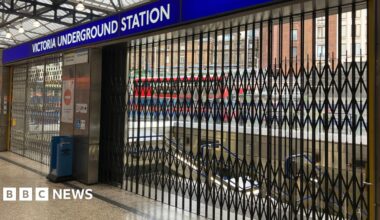 Victoria Underground station entrance barriers pulled across
