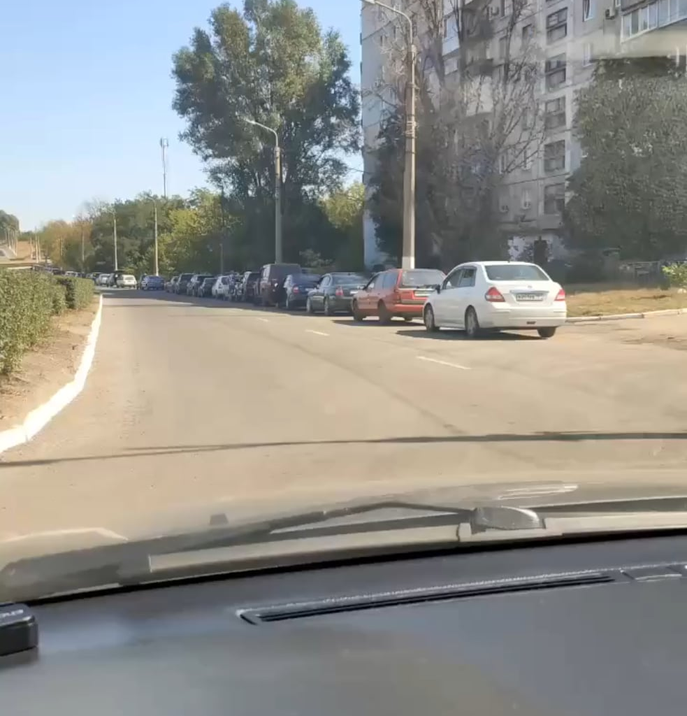 A line of cars at a gas station in occupied Luhansk