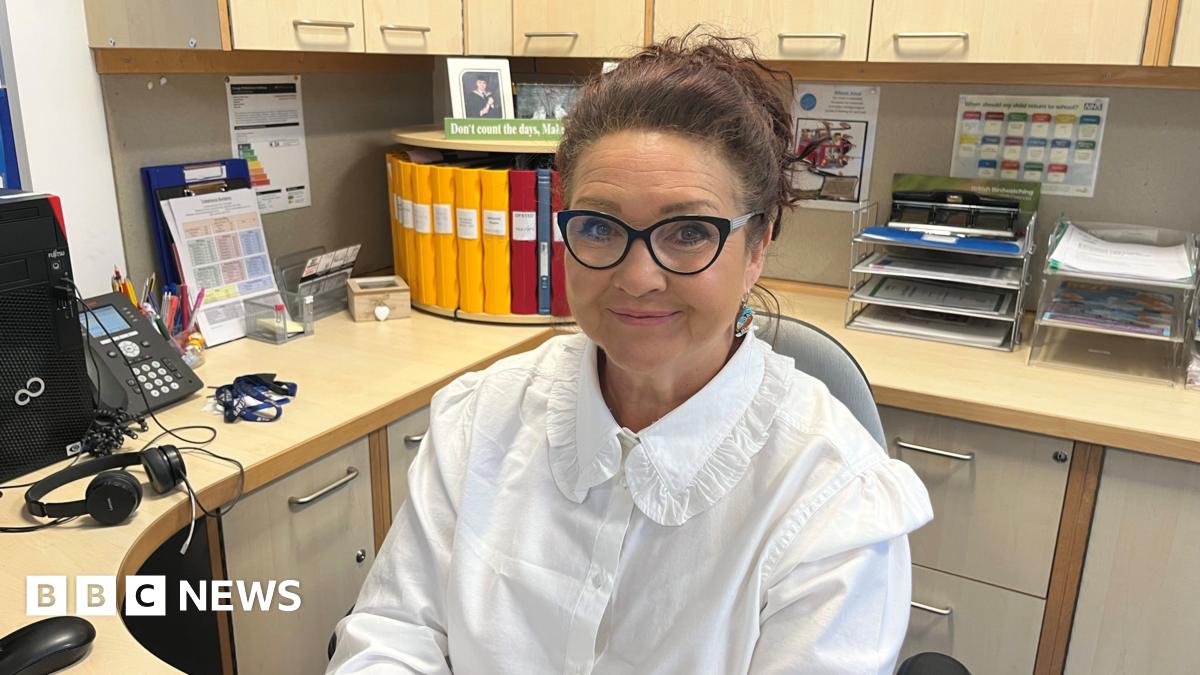 Head teacher Joanne Hurst sitting behind her desk