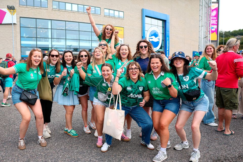 Ireland supporters and former and current players, including Ailsa Hughes, Aoife McDermott and Lindsay Peat, before the Women's Rugby World Cup 2025 Pool C match between New Zealand and Ireland