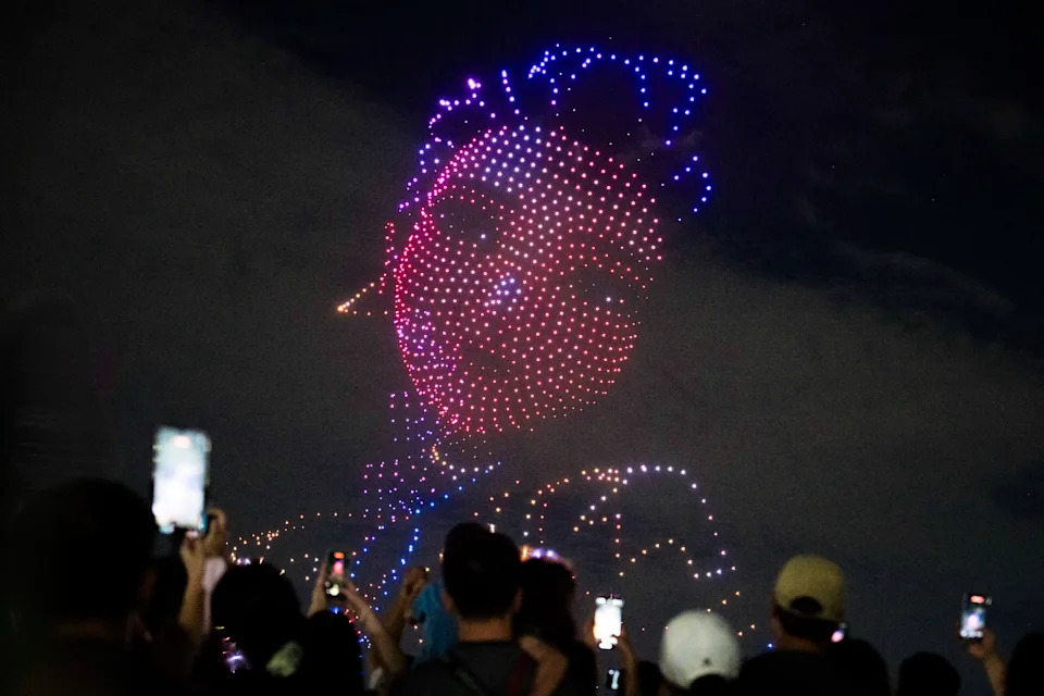Rumi, the movie's main protagonist and a member of Huntr/x, is displayed during a “KPop Demon Hunters”-themed drone show at Ttukseom Hangang Park in Seoul on Sept. 7. - (Jintak Han/The Washington Post)