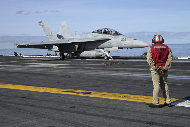 An F-18E fighter jet prepares to take off from the aircraft carrier USS Gerald Ford during NATO's 'Neptune Strike 2025' military exercise in the North Sea, September 24, 2025.
