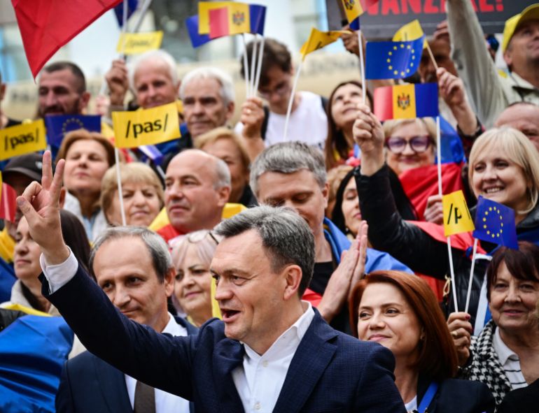 Moldova's prime minister Dorin Recean attends a rally of Action and Solidarity Party PAS in Chisinau on September 26, 2025 ahead of parliamentary elections.