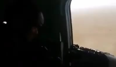 Iraqi army aviation door gunner fires at isis vehicle hidden in the middle of Anbar desert.