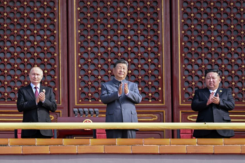 North Korean leader Kim Jong Un, Chinese President Xi Jinping and Russian President Vladimir Putin attend a military parade in Beijing on September 3.