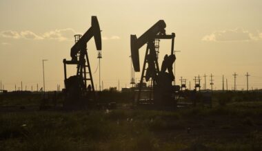Oil settles lower as OPEC+ plan adds to expectations of supply surplus