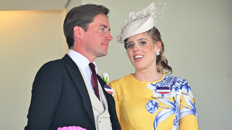 Beatrice wears fuscia next to Prince Harry