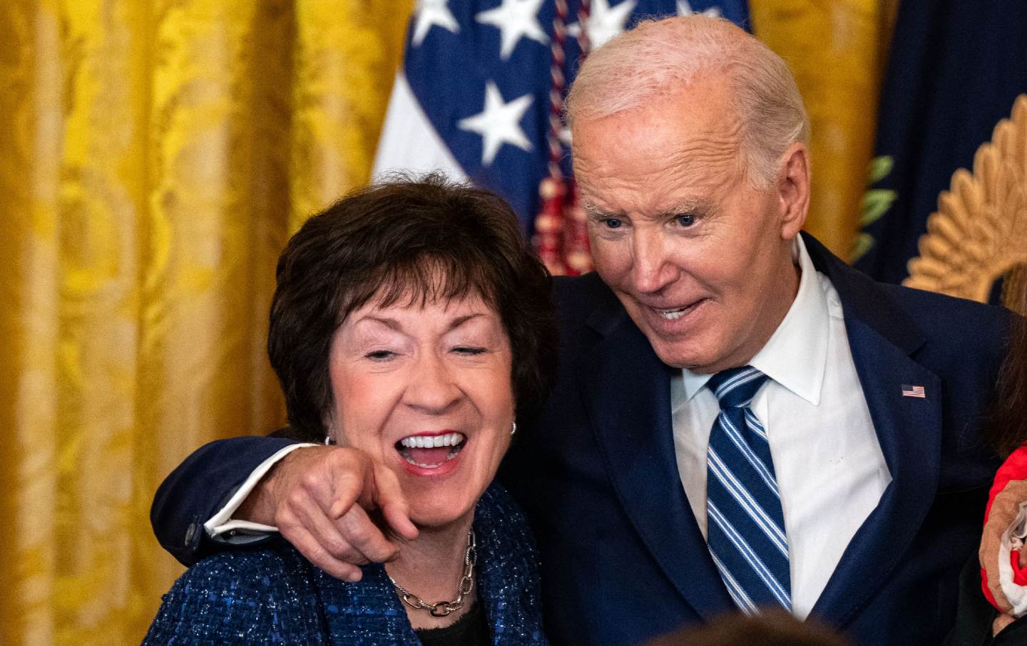 Senator Susan Collins (R-ME) poses with President Joe Biden in the East Room of the White House on January 5, 2025, in Washington, DC.