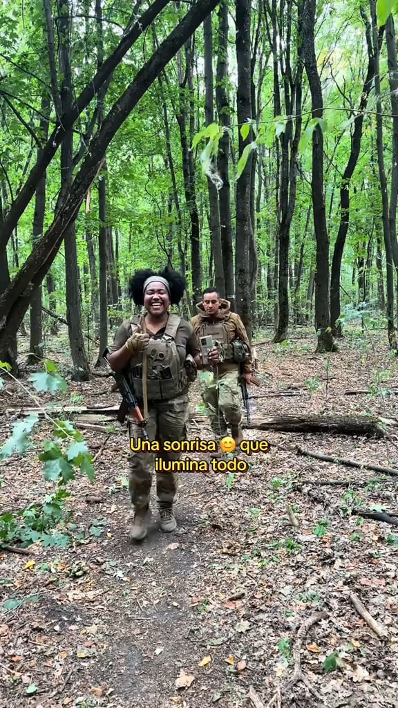 Colombian volunteers of Ukraine's 117th Territorial Defense Brigade pay tribute to fallen comrade 'Nana' (Nanis Rodríguez Castañeda), recently killed in combat near Yampil, Donetsk Oblast