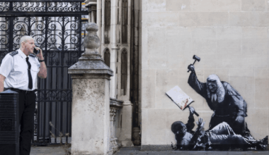 UK immediately covered up new Banksy art, commenting on the arrest of peaceful protest. Would be a shame if it was shown everywhere