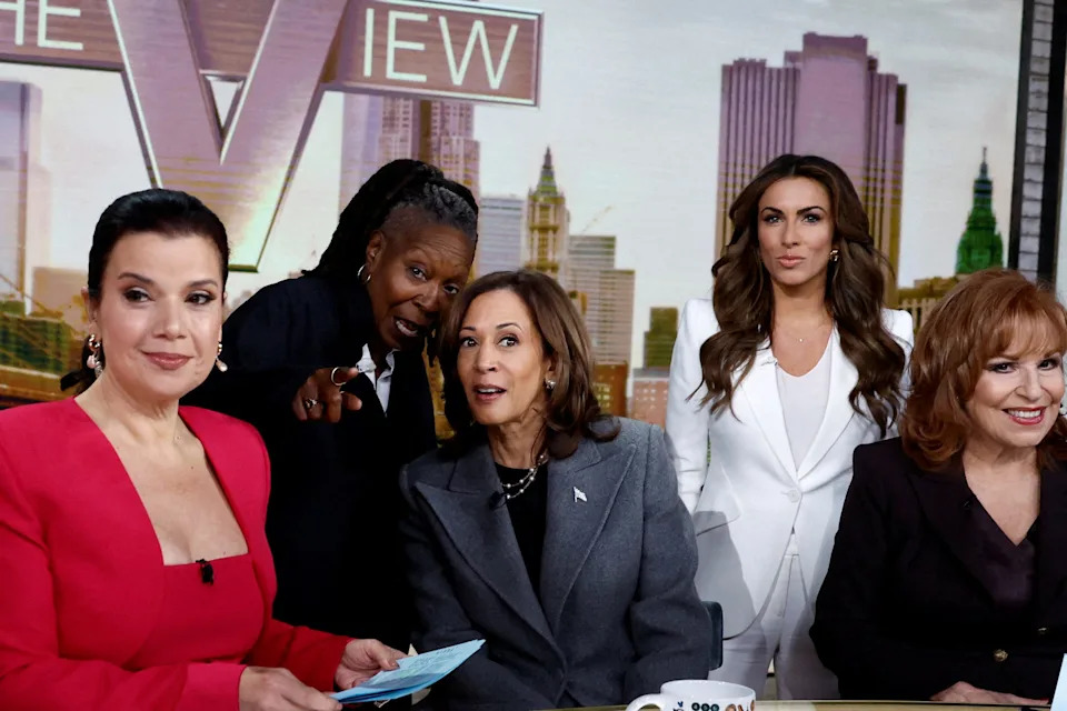 Whoopi Goldberg gestures next to Democratic presidential nominee and Vice President Kamala Harris as they appear on ABC's "The View" in New York, October 8, 2024.