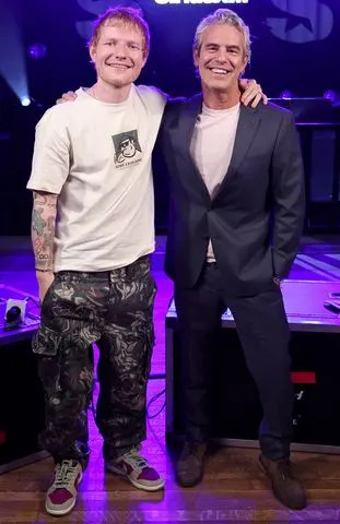 Jamie McCarthy/Getty  Ed Sheeran and Andy Cohen