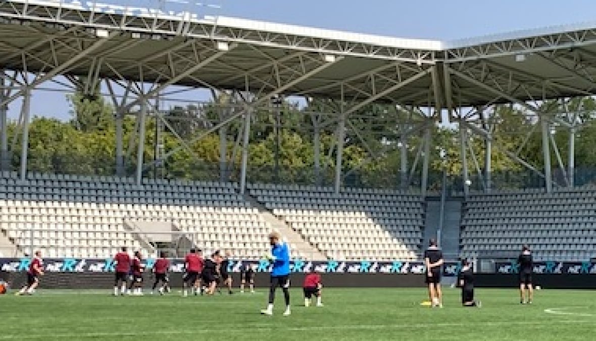 A soccer team trains.