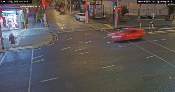 CCTV shows car speeding through Auckland CBD just before hitting police car