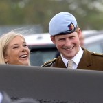 Prince Harry and Chelsy Davy laugh as they attend Prince Harry's Pilot Course Graduation at the Army Aviation Centre on May 7, 2010 in Andover, England.