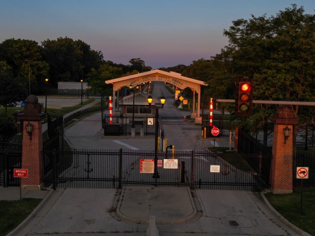 A west entrance along Sheridan Road at sunset to the Naval Station Great Lakes, Sept 2, 2025, where federal immigration agents are rumored to be stationed. (Stacey Wescott/Chicago Tribune)