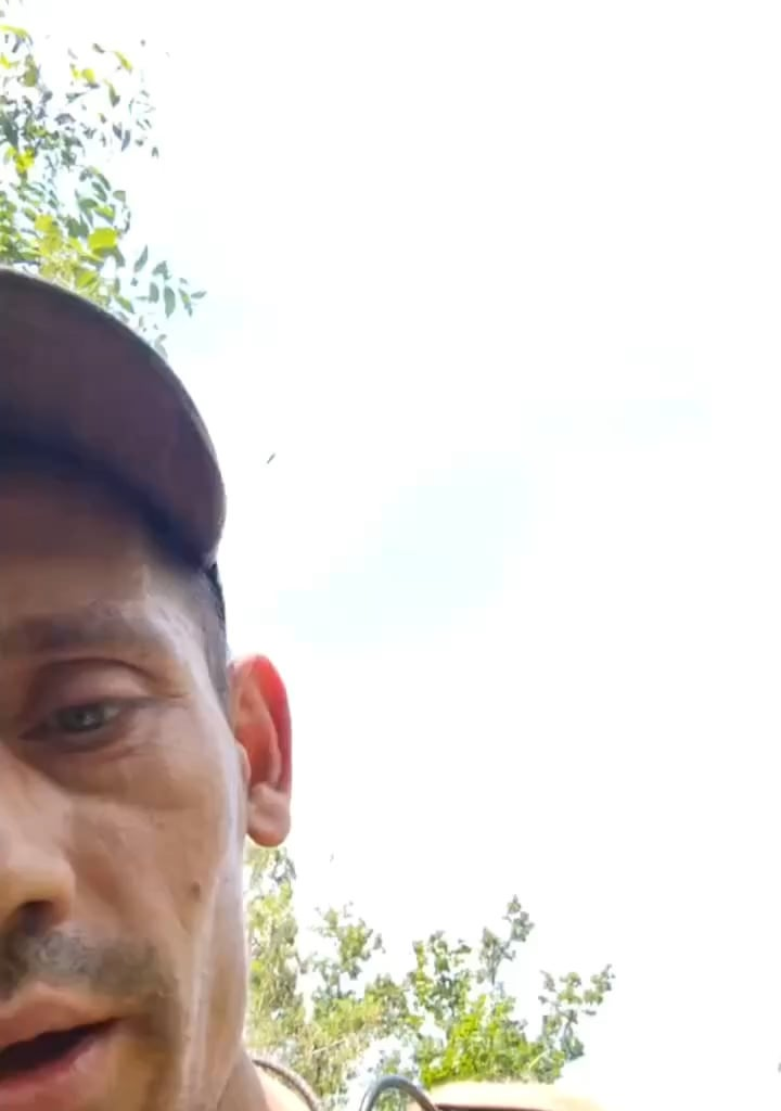 Russian soldier sent to the frontlines without any gear is happy about looting a vest and a helmet off of his dead comrades