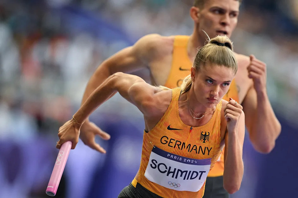 TOPSHOT - Germany's Alica Schmidt competes in the mixed 4x400m relay heat of the athletics event at the Paris 2024 Olympic Games at Stade de France in Saint-Denis, north of Paris, on August 2, 2024. (Photo by Andrej ISAKOVIC / AFP) (Photo by ANDREJ ISAKOVIC/AFP via Getty Images)