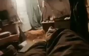 A Russian soldier is filming the impact of a Ukrainian FPV quad on his position while resting in his bunk bed.  Zaporizhzhia Oblast.