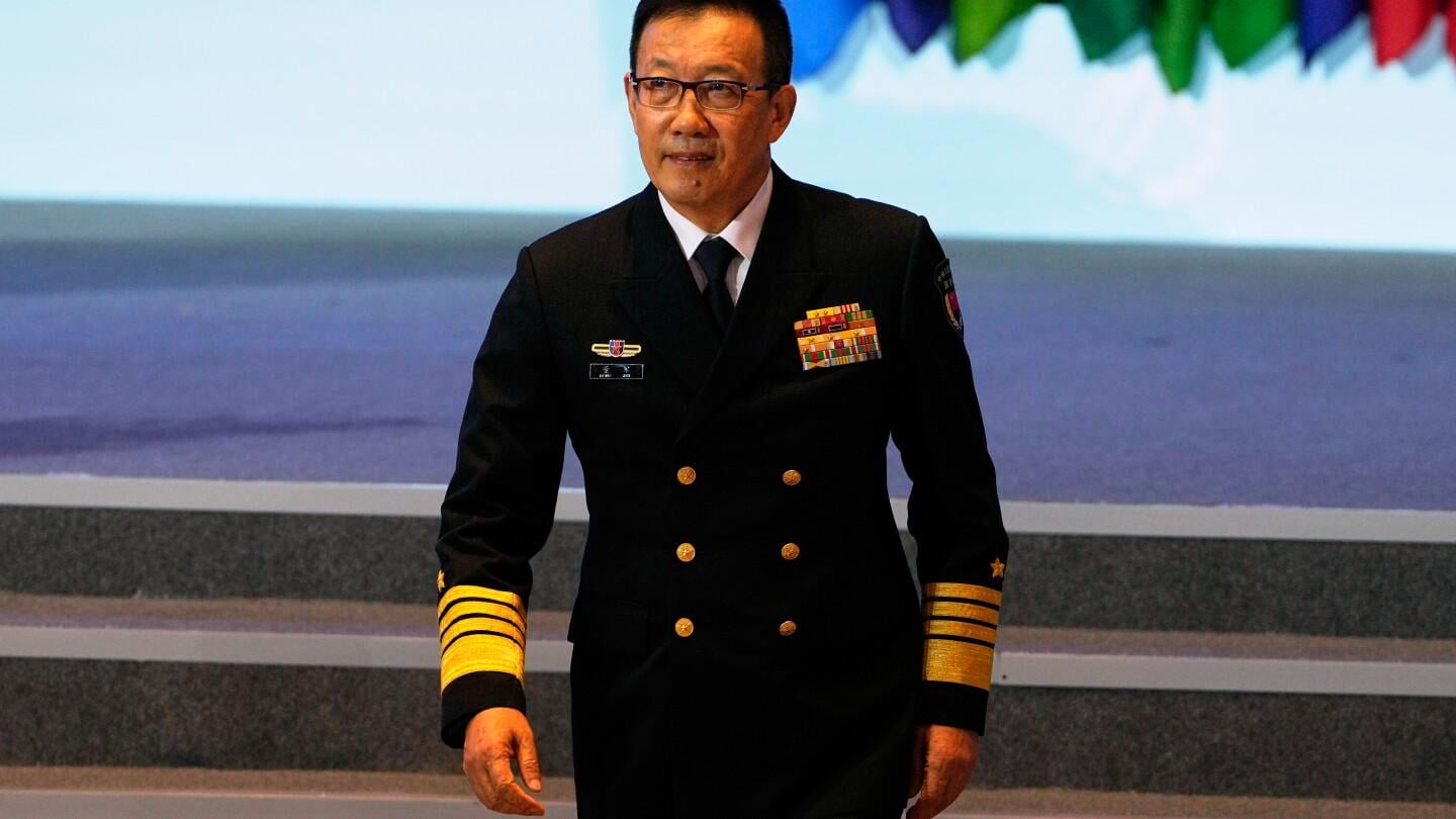 China’s defense minister renews threats to take over Taiwan as he opens security forum