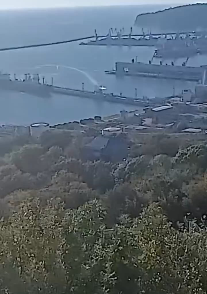 Russian civilians filming the moment a Ukrainian naval drone struck the oil loading pier at the port of Tuapse today.