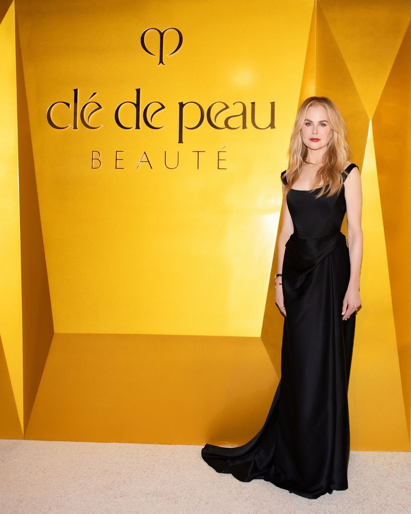 Nicole looked striking in a simple black dress