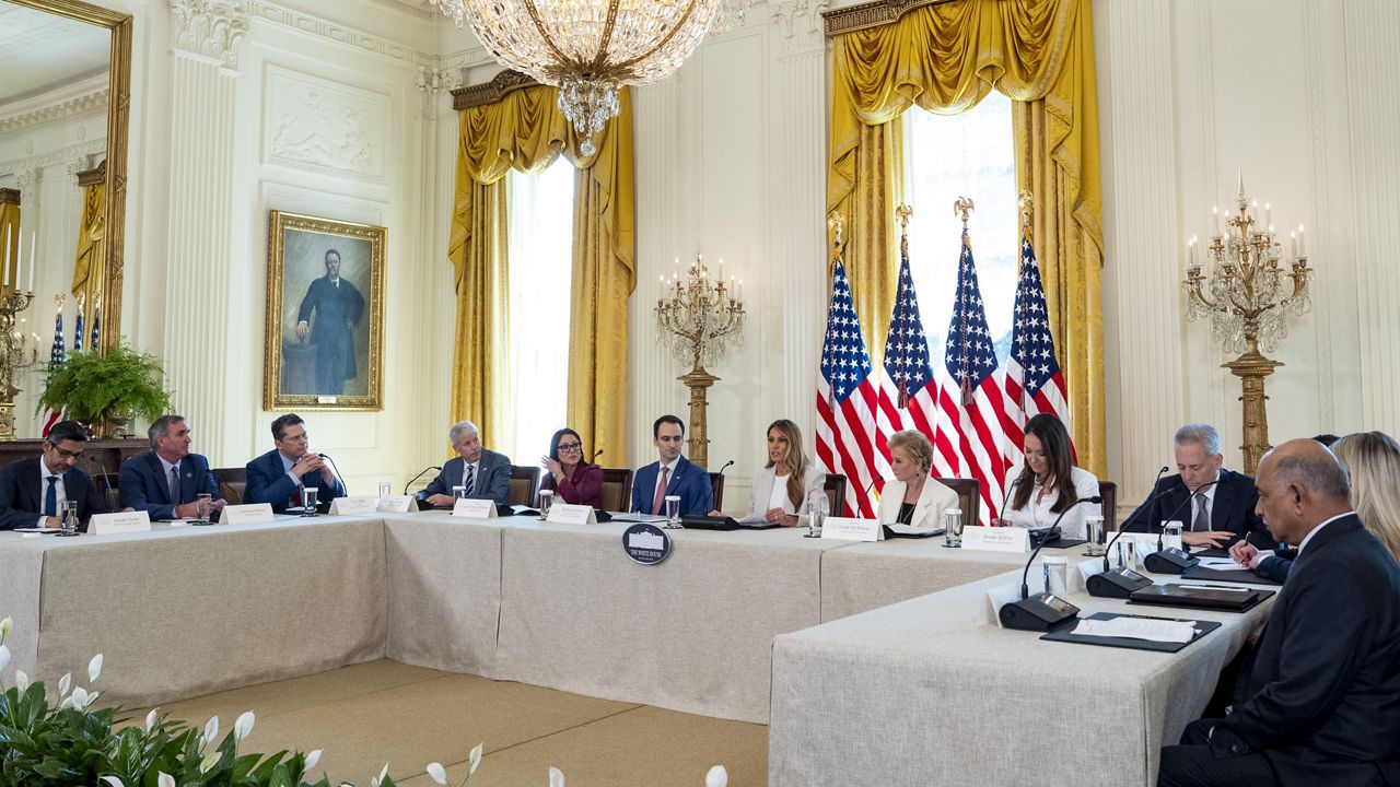 First lady Melania Trump, center, speaks during a meeting of the White House Task Force on Artificial Intelligence Education in the East Room of the White House, Thursday, Sept. 4, 2025, in Washington. (AP Photo/Alex Brandon)