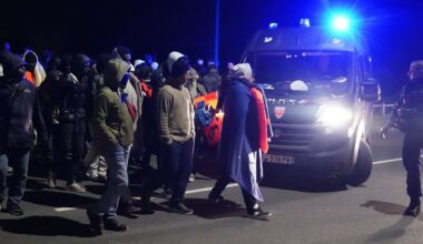 French riot police block dozens of asylum seekers from reaching small boats in early hours confrontation