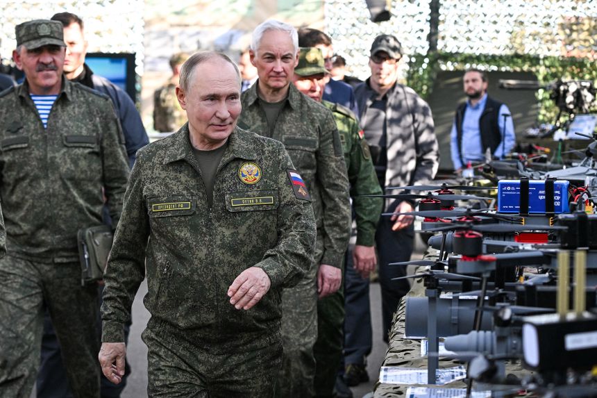Russia's President Vladimir Putin tours an exhibition of military equipment while attending the joint Russian-Belarusian military drills at a training ground in the Nizhny Novgorod Oblast, Russia.