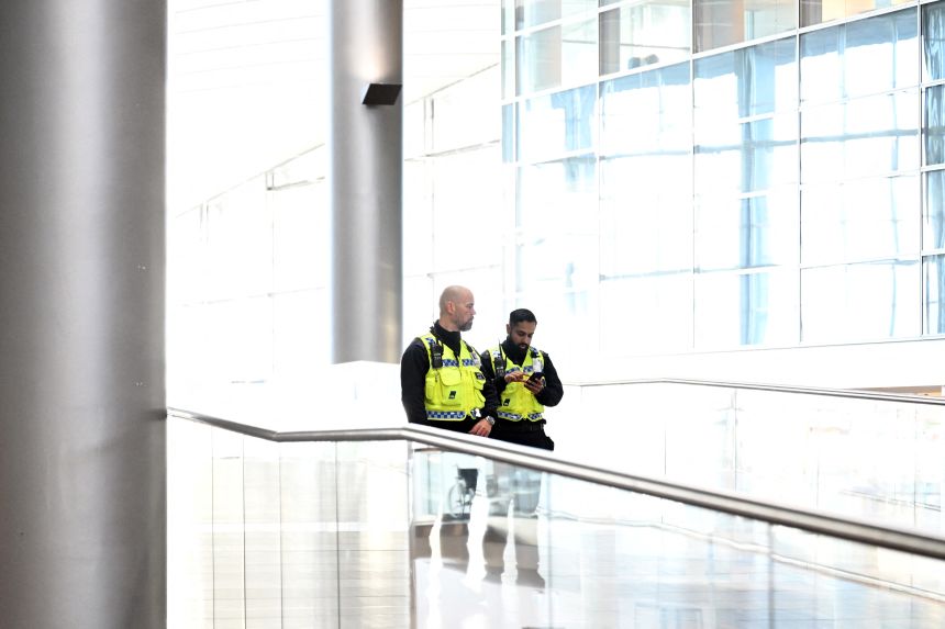Security officers are seen at the Copenhagen Airport in Copenhagen, Denmark, on September 23, 2025.