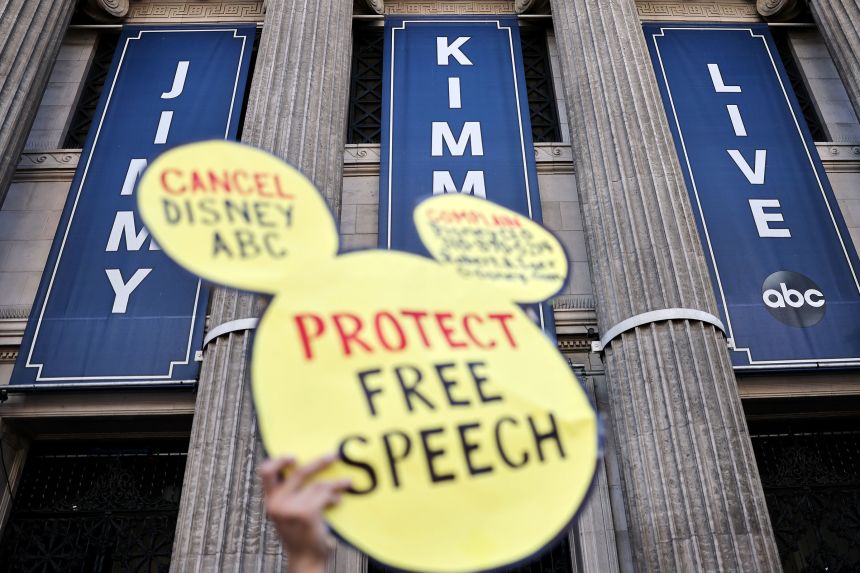 A demonstrator waves a 