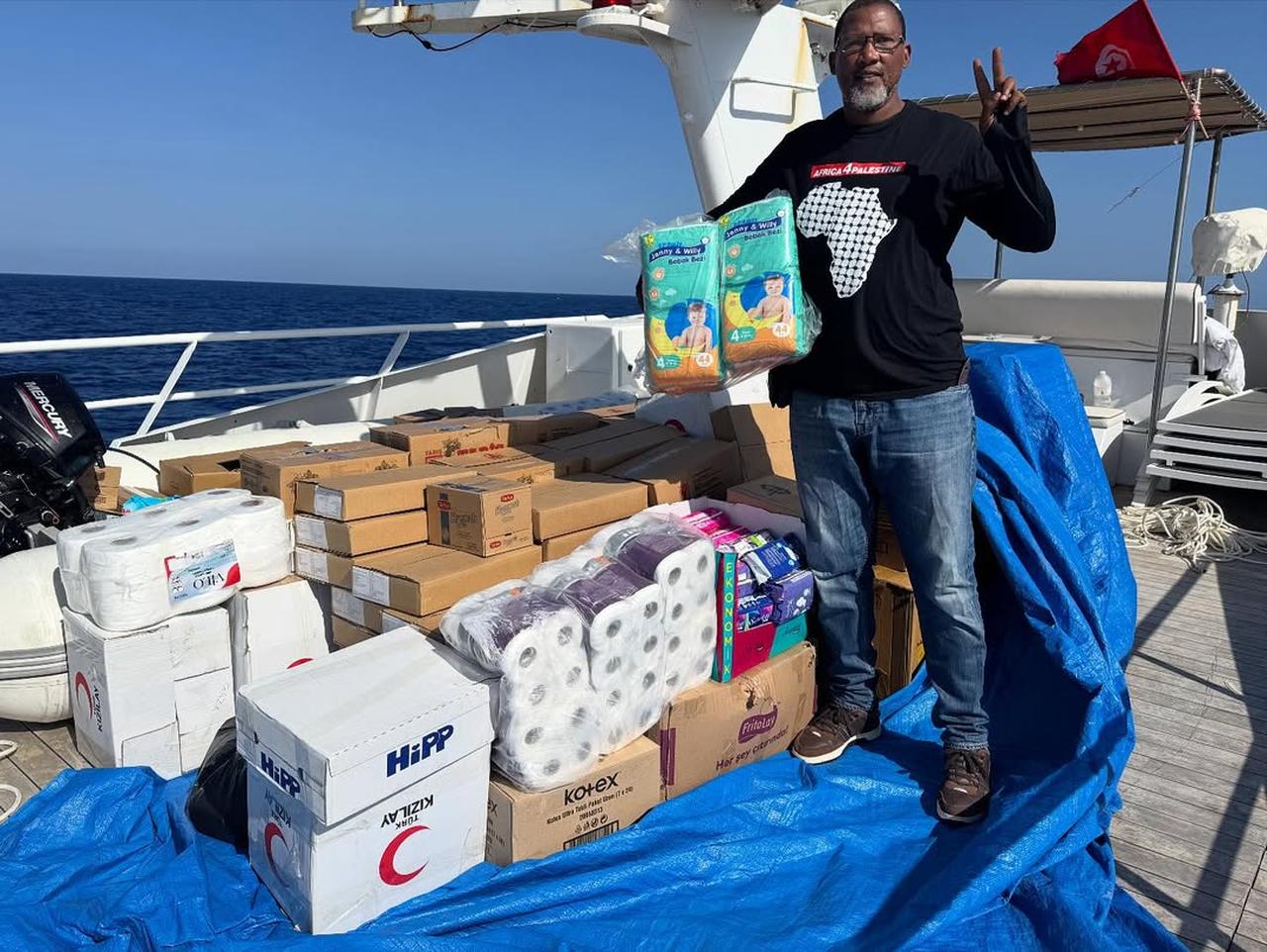 Nelson Mandela’s grandson on the Sumud flotilla, receiving a Turkish aid consignment. September 29, 2025. ( Photo via Instagram / @Nkosi Zwelivelile  )