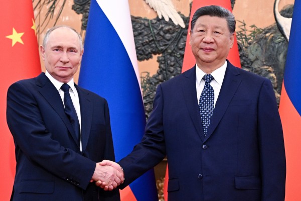 Xi and Putin reaffirm 'old friend' ties in the face of...