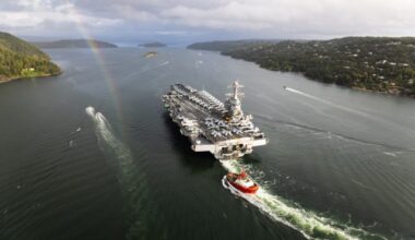 Aircraft carrier arrives as tensions rise
