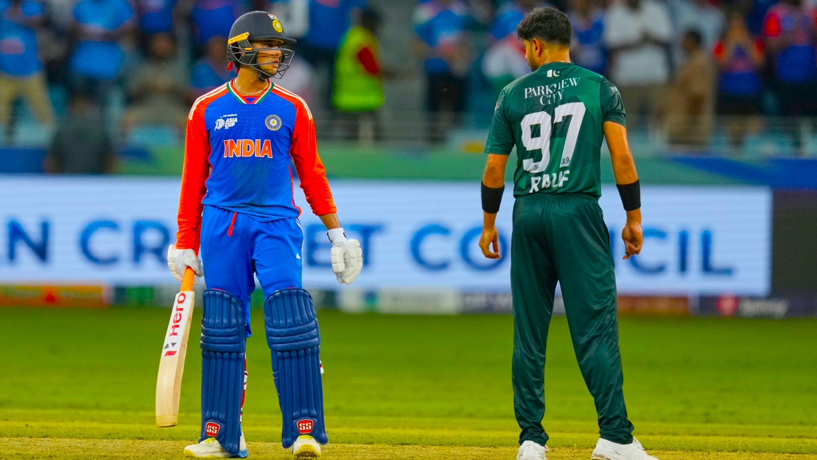 IND vs PAK: India's Abhishek Sharma talks to Pakistan's Haris Rauf during the Asia Cup cricket match between India and Pakistan at Dubai International Cricket Stadium, United Arab Emirates, Sunday, Sept. 21, 2025. (AP Photo)