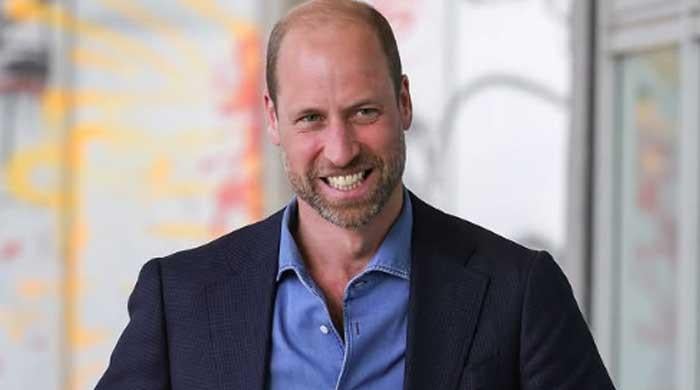 Photo offers rare look at UK's future king