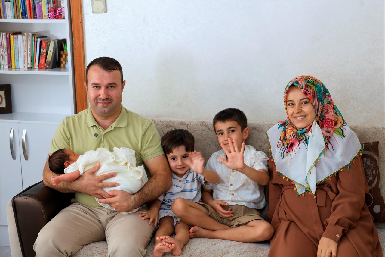 The Soylu family with their newborn, who survived life-threatening complications through an international blood transfer of Rh-null. (Photo via Turkish Red Crescent)