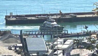 At least one dead as helicopters scramble to migrant boat sinking