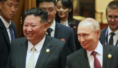 Kim Jong Un and Vladimir Putin walk side by side