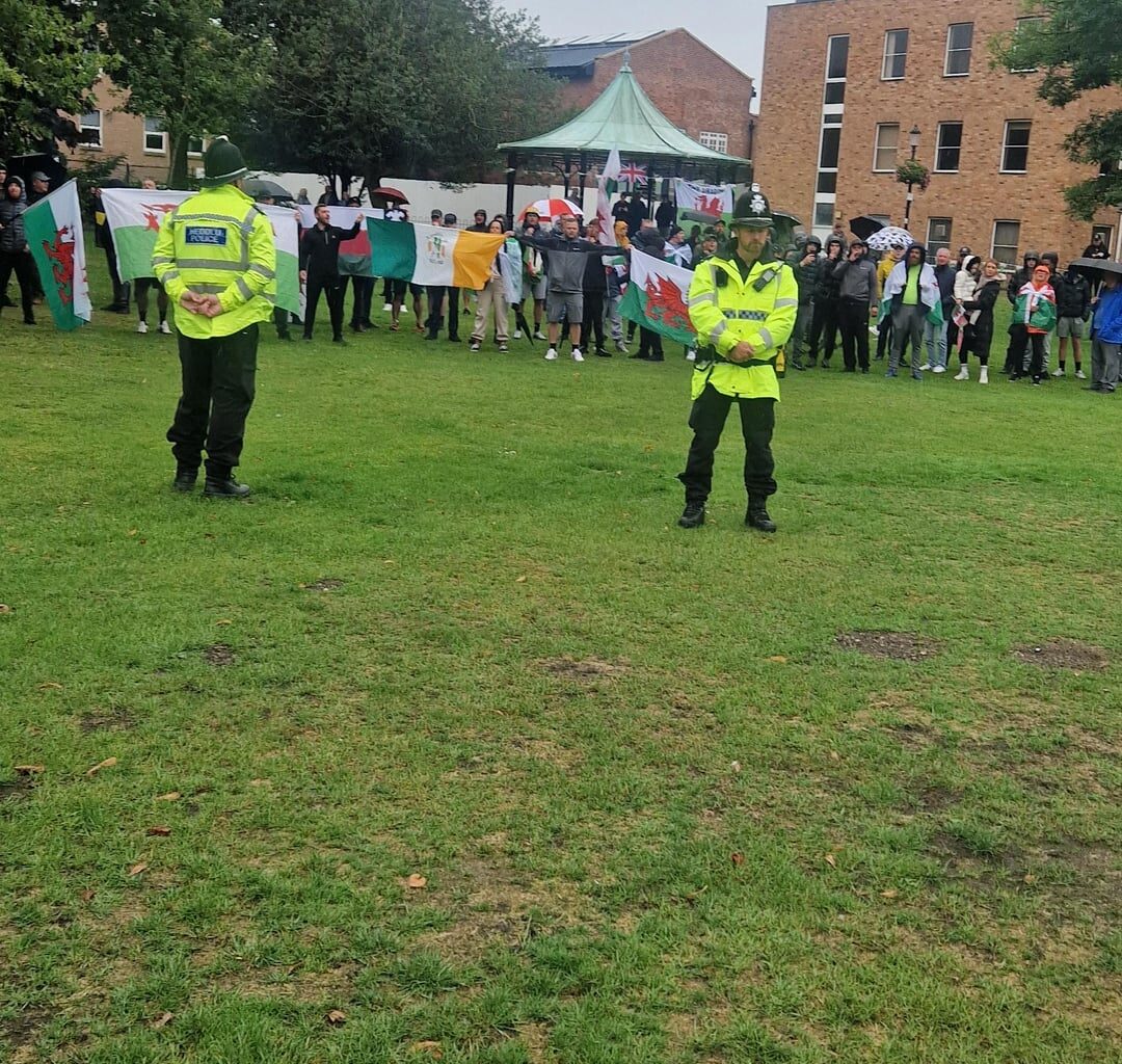 Wrexham counter protest today, along with images of racist protests with union jack and irish flags