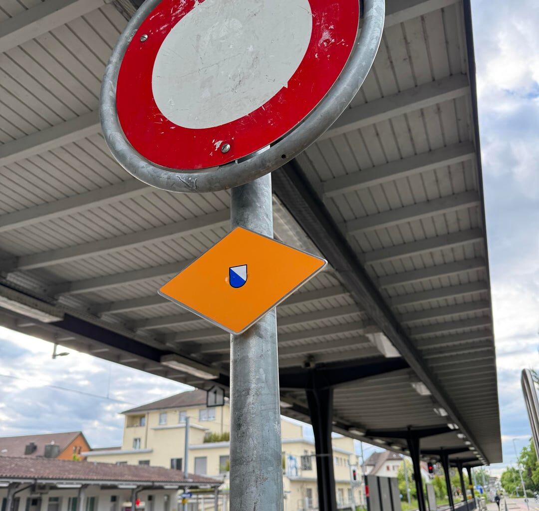 [Mildly Interesting] The Wanderweg sign at Bahnhof Dietikon is recycled