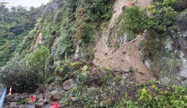 Slip closes West Coast highway, heavy downpours for lower North