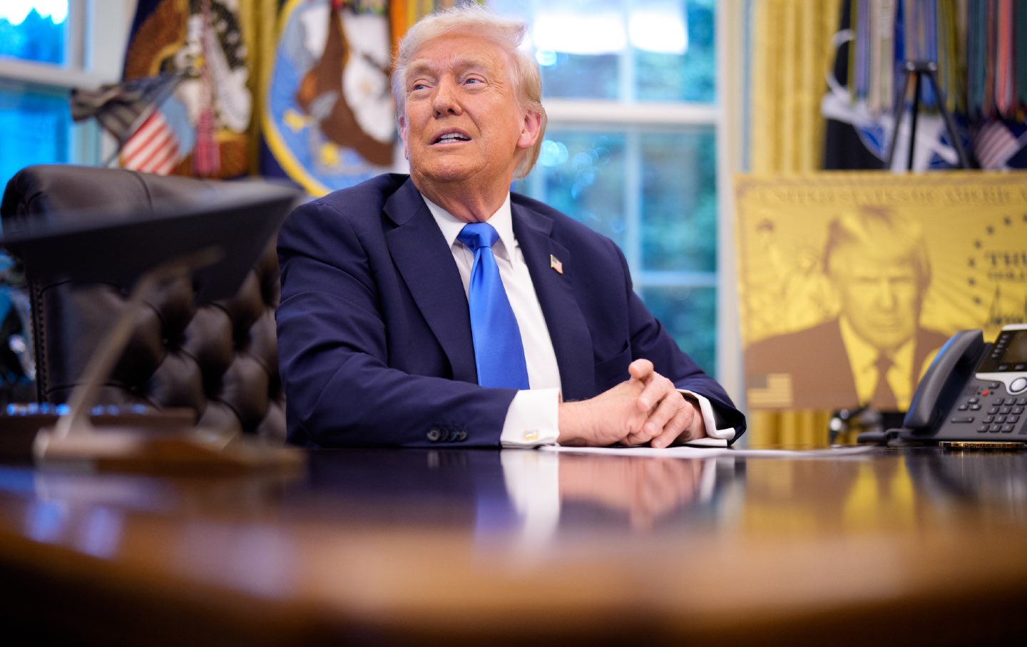President Donald Trump speaks before signing executive orders in the Oval Office at the White House on September 19, 2025, in Washington, DC. Trump signed two executive orders, establishing the “Trump Gold Card” and introducing a $100,000 fee for H-1B visas.
