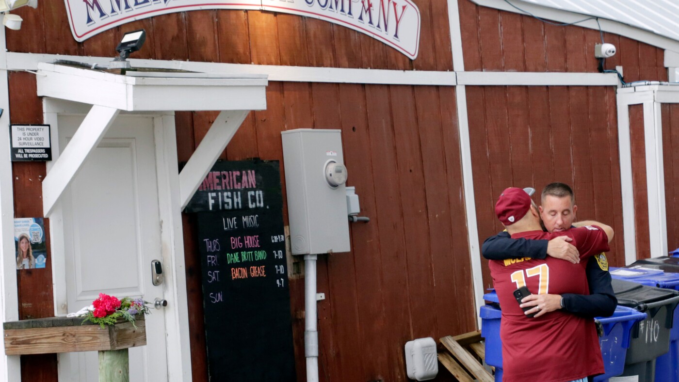 Suspect held in waterfront bar shooting that left 3 dead in North Carolina : NPR