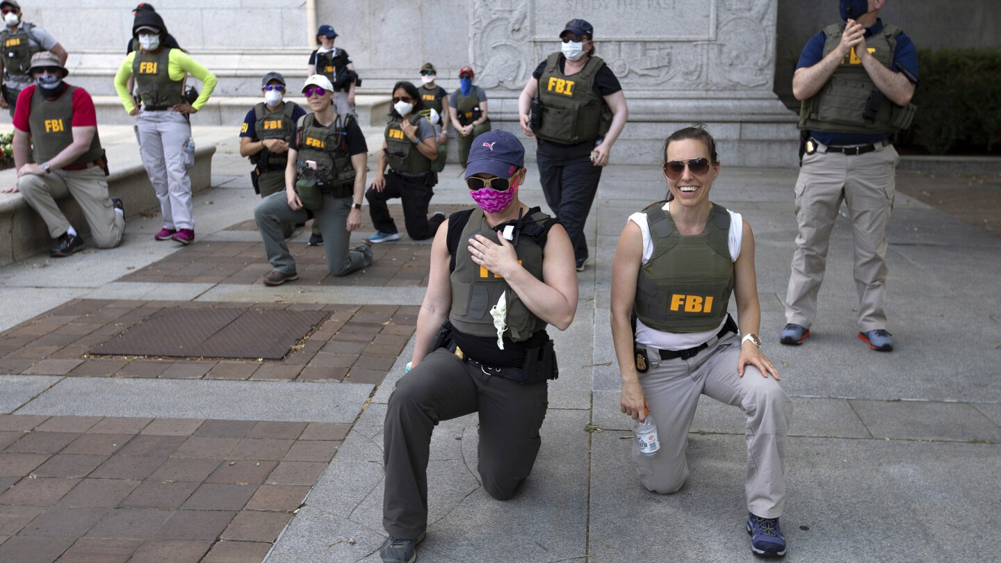 FBI fires agents for kneeling during racial justice protest, AP sources say
