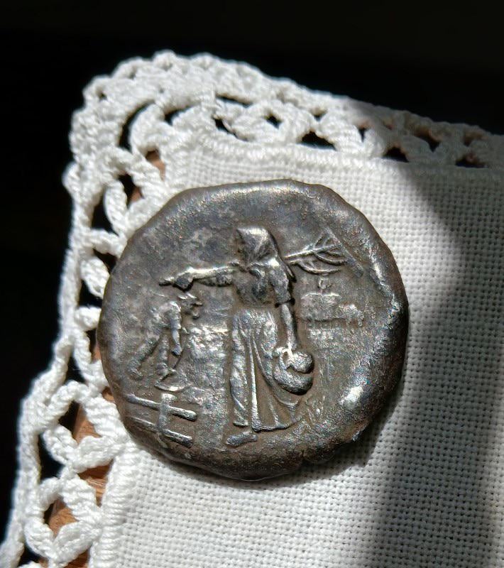 My grandpa found this in his garden. Seems to be silver. I don’t have a picture of the back at this moment.can someone tell me something about it?