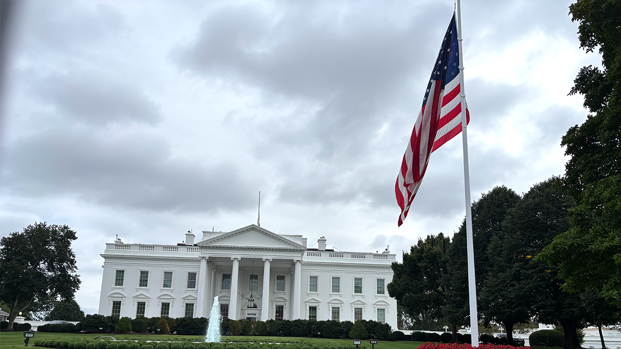 American flags stand at half-mast in honor of conservative leader Charlie Kirk