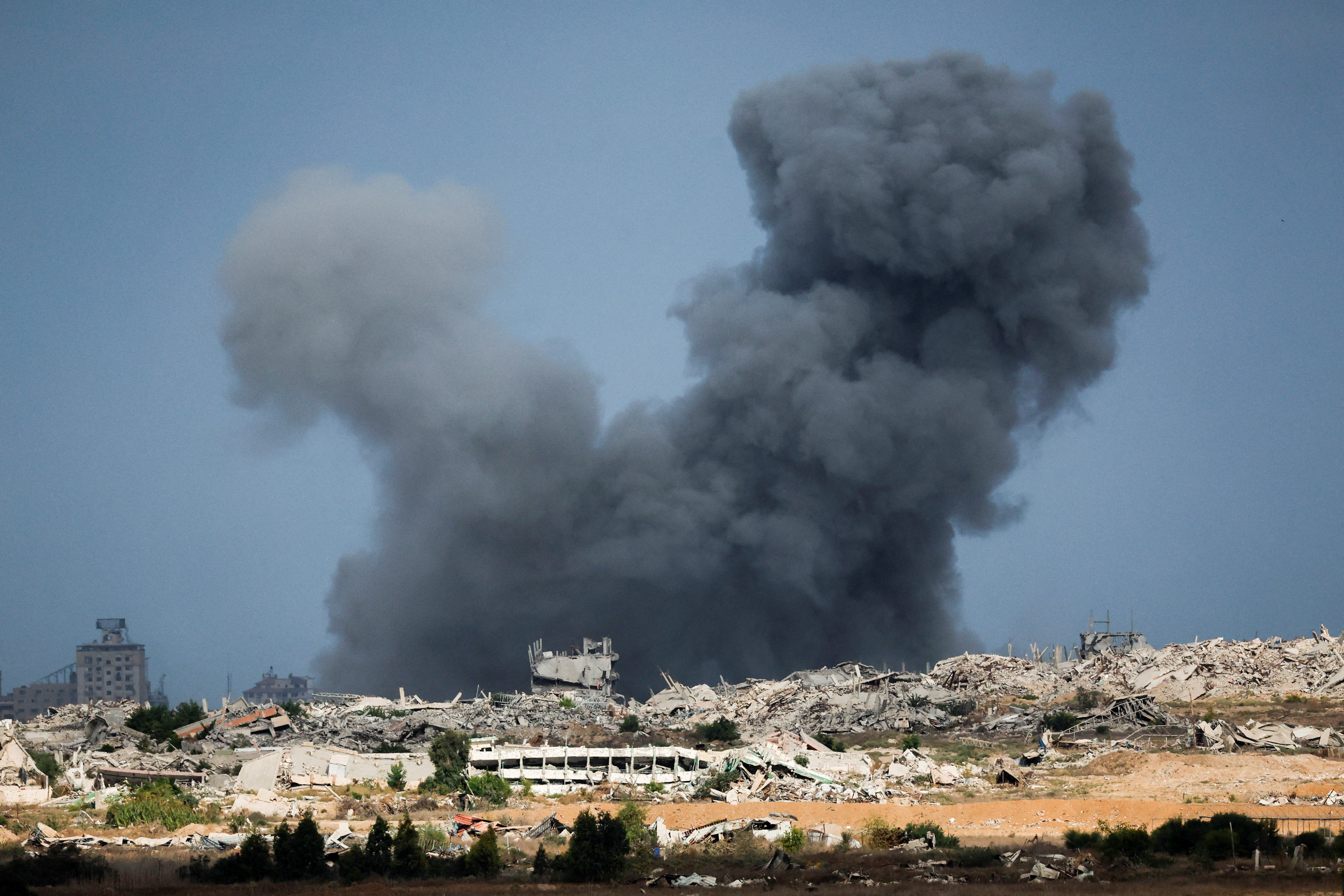 Smoke rises from Gaza after President Trump announced that Israel and Hamas agreed on the first phase of a Gaza ceasefire